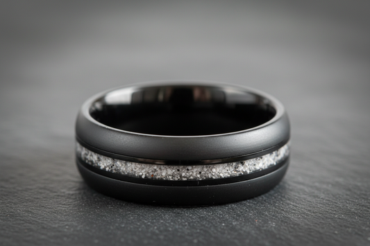 Black ceramic memorial ring transforming cremation ashes into wearable jewelry keepsake