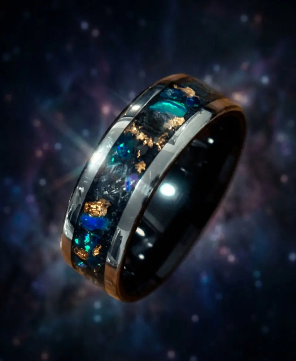 Ring with embedded gemstones against a dark, starry space background