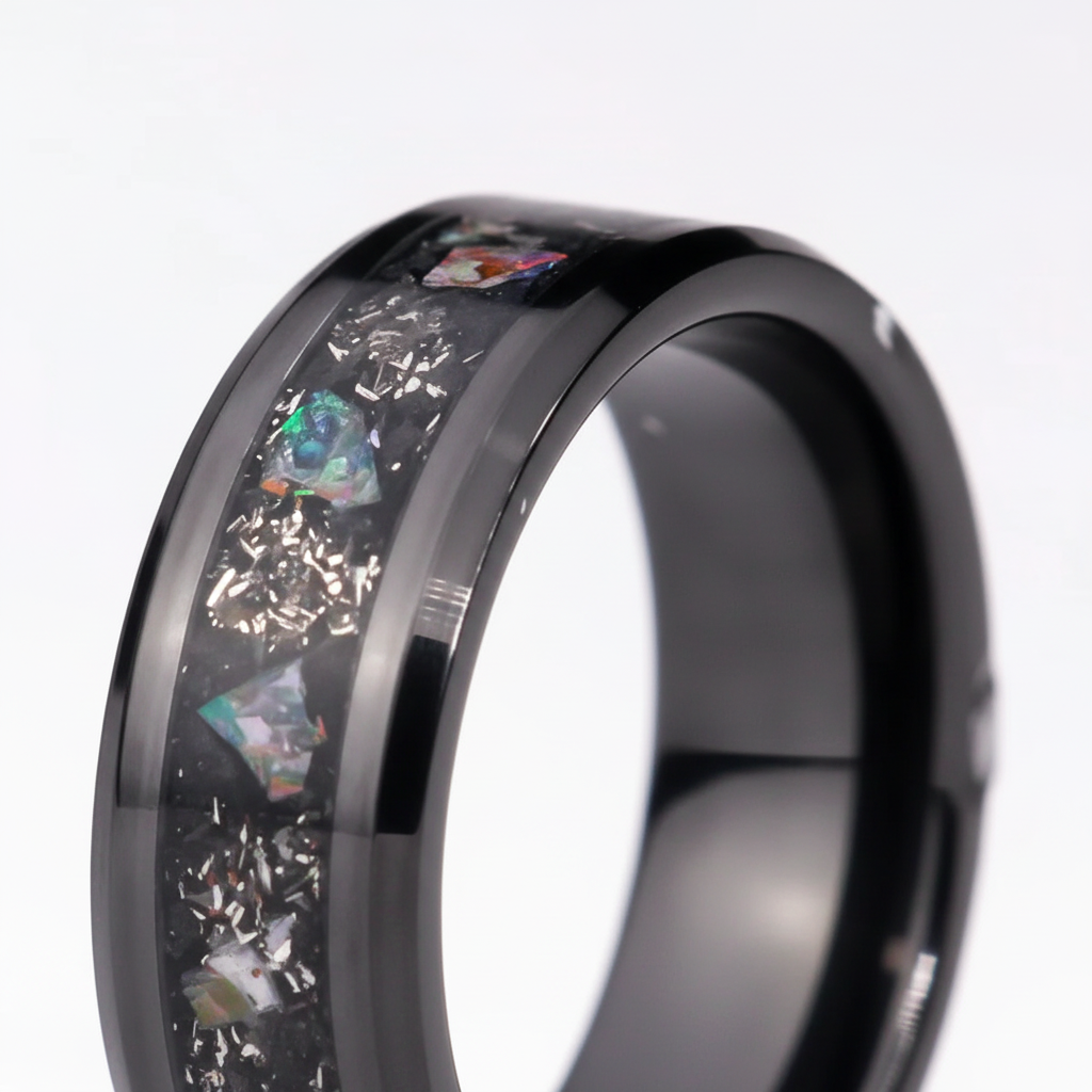 Close-up of Nebula Ash ceramic ring showing ash and opal inlay detail